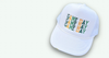 White trucker hat with green and gold GAME DAY lettering, custom spirit wear from Connie's Impressions in Hammond, LA